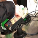 avatar Swiping Dollar On Card Reader