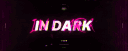 IN DARK banner