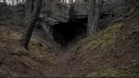 The Cave Banner