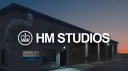 Her Majesty's Studios banner
