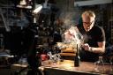 Discovery splash banner for Adam Savage's Tested Discord server