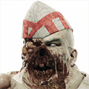 A decaying zombie with exposed bone and flesh wearing a white and red fast-food paper hat.