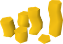 Yellow cylinders stacked together in a small pile.