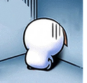 A white round character sitting in a corner with vertical lines of sadness.