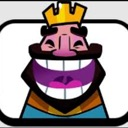 King with a golden crown laughing with a wide, mischievous grin.