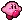 Kirby walks across the screen in a repeating pixelated animation.