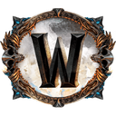 Letter W displayed in a bold, dark font inside an ornate, weathered circular bronze frame.
