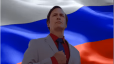 A man in a suit stands with a serious expression in front of a waving flag.