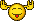 A repeating pattern of yellow smiley faces with moose antlers and tongues sticking out.