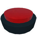 Red button with a black base sitting on a surface.