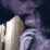A couple sharing an intimate kiss in a repeated, low-resolution sequence.