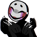 A masked figure with a pale face and dark, claw-like hands held up in an excited, manic gesture.