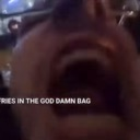A person with their mouth wide open in a loud scream with text overlaying the image.