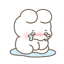 A small, round white creature sitting in a blue puddle while crying with rosy cheeks.