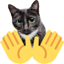A gray cat with green eyes holding up two yellow cartoon hands in a jazz hands gesture.