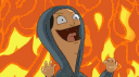 A person in a gray hoodie laughing maniacally in front of a bright orange fire.