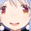 Anime girl with large eyes and a mischievous smirk looking directly at the viewer.