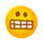 grimacing
