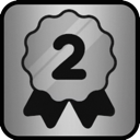 Silver badge with a black number two and a ribbon tail.