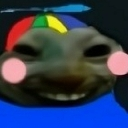 A distorted cat face wearing a rainbow propeller hat with pink blushing cheeks.