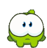 Om Nom with large, sparkling blue eyes looking up with an adorable expression.