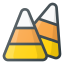 Candy corn pieces with white, orange, and yellow stripes.