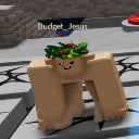 A blocky, tan-colored character with a smug expression and a crown of leaves on its head.