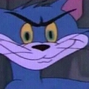 Tom Cat with a wide, devious smirk and narrowed, suspicious eyes.