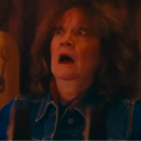 Woman with a wide-eyed, open-mouthed expression of shock.