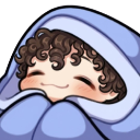 A person with curly hair smiling happily while wrapped in a blue blanket.