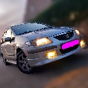 Mazda car driving forward with glowing headlights and a bright pink license plate.