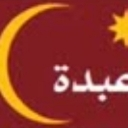 A yellow crescent moon and a small star sit on a dark red background with partial Arabic text.