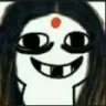 A stylized character with a red bindi and a wide, toothy, mischievous grin.