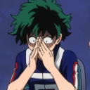Izuku Midoriya covering his face with his hands while looking panicked and embarrassed.