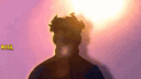 Mark Grayson from Invincible appearing in a four-part sequence from silhouette to full costume.