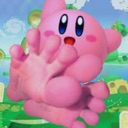 Kirby reaches forward with a hand that has an unnaturally large number of fingers.
