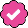 Checkmark symbol inside a scalloped pink circular badge.