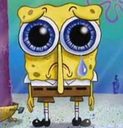 SpongeBob with massive, teary eyes looking deeply sad.