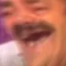 El Risitas laughing hysterically with his mouth wide open.