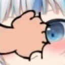 A cartoon hand punching an anime character in the eye.