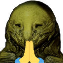 A textured, greenish-brown creature with a mask-like face holding its hands together in a prayer gesture.