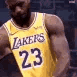 LeBron James wearing a purple and gold Lakers jersey looking down with a serious expression.