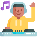 A person wearing a yellow hoodie standing behind a music mixing console with a happy expression.