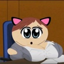 A cartoon character with cat ears and large, wide eyes looking surprised while sitting at a desk.