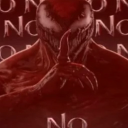 Carnage from Marvel comics making a shush gesture with his finger over his mouth against a red background with the word NO.