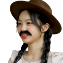 A person wearing a brown hat and a fake black mustache smiling.