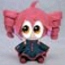 A chibi anime character with pink hair and large, glossy eyes looking forward with a blank, confused expression.