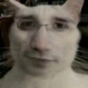 A low-resolution, distorted human face wearing glasses with cat ears edited onto the top of the head.