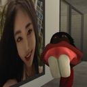 A woman's face on the left side and a dark, toothy creature on the right side.