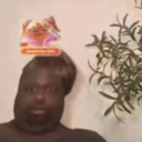 A person with a wide-eyed, stunned expression looking directly at the camera.